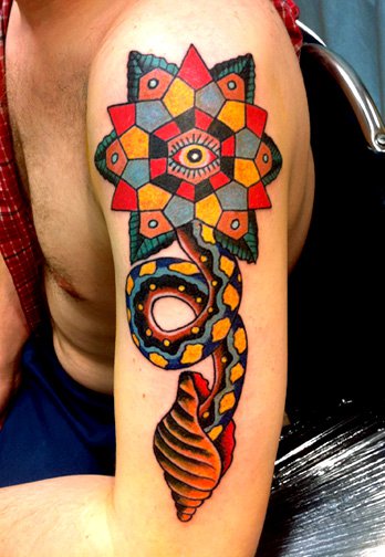 Awesome shoulder tattoo by Robert Ryan