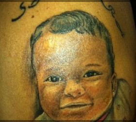 Awesome tattoo with baby