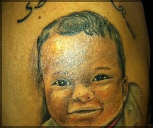 Awesome tattoo with baby