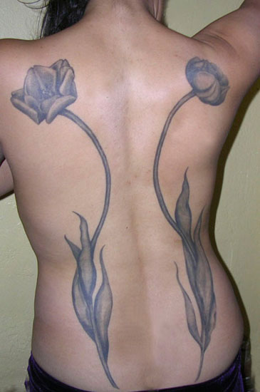 Awesome tulips tattoo on the back