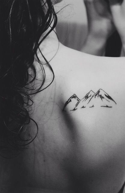 Back mountains tattoo