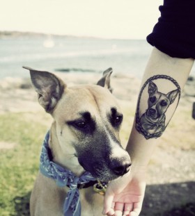 Beautiful dog tatto on the hand