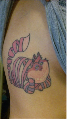 Big pink cat tattoo