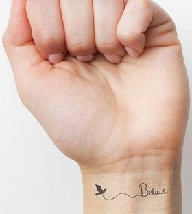 Birds believe tattoo on wrist