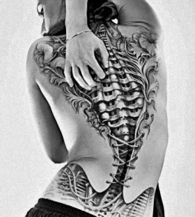 Black and white corset tattoo