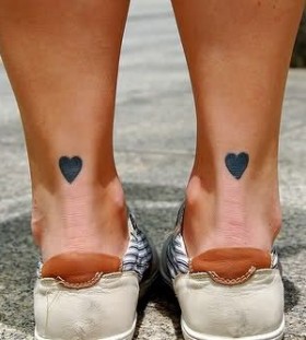 Black heart tattoo