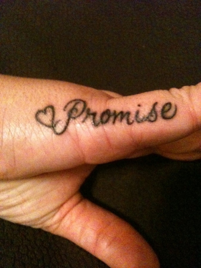 Black promise tattoo