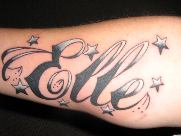 Black tattoo with name and stars