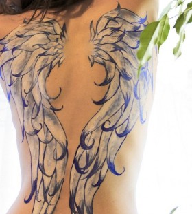 Blue and white wings tattoo