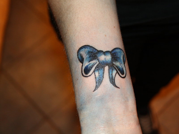 Blue blow tattoo