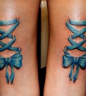 Blue corset tattoo