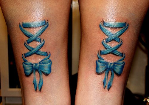 Blue corset tattoo