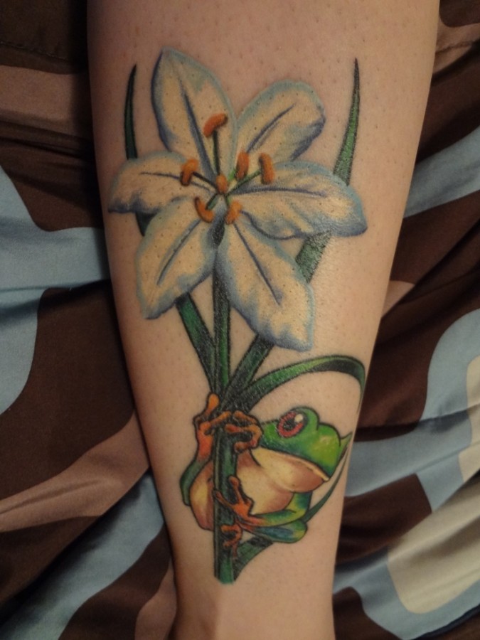 Blue flower and frog tattoo