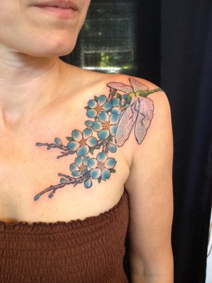 Blue flowers tattoo by Miah Waska