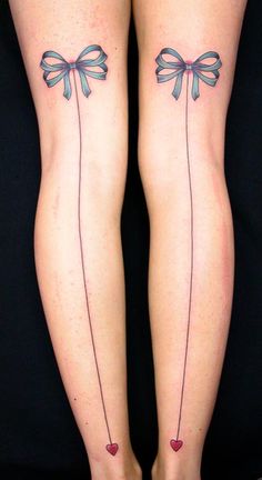 Bows on leg tattoo