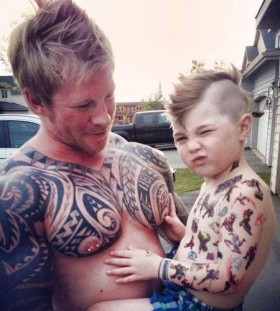 Boy and father tattoos
