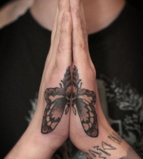 Butterfly bug tattoo