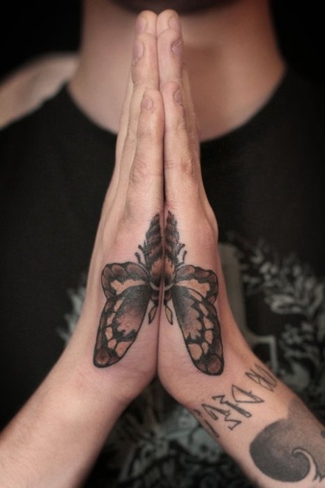 Butterfly bug tattoo