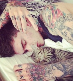 Cat and man tattoo