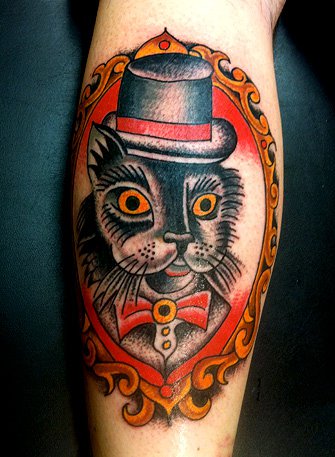 Cat tattoo by Robert Ryan