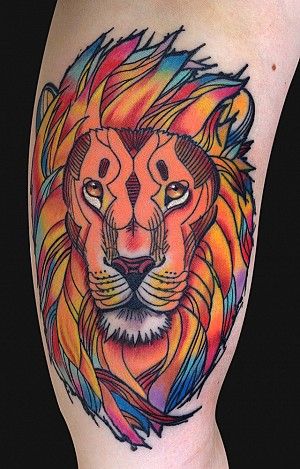 Colorful lion tattoo by Art Junkies