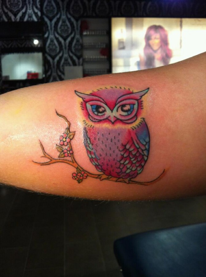 Colorful owl tattoo by Hania Sobieski