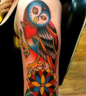 Colorful owl tattoo by Robert Ryan