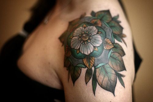 Colorful tattoo by Alice Carrier