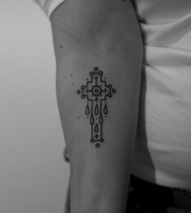 Cross tattoo by Jean Philippe Burton