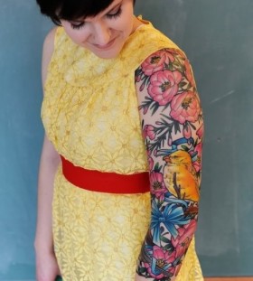 Cute woman sleeve tattoo