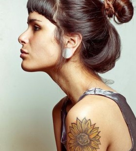 Cute woman sunflower tattoo