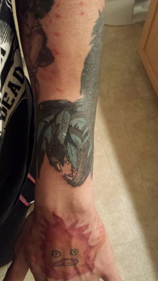 Dinosaur tattoo by Lisa Orth