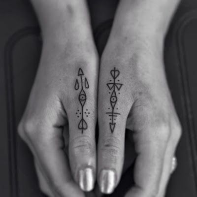 Fingers tattoo by Jean Philippe Burton
