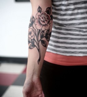 Flower tattoo by Alice Carrier