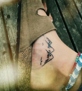Foot mountains tattoo