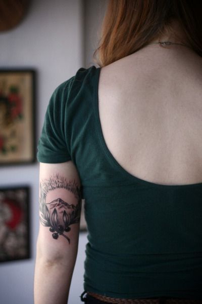 Girl hand mountains tattoo