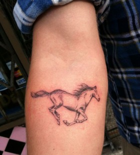 Hand horse tattoo