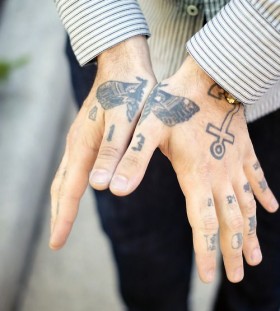 Hands bug tattoo