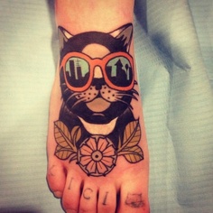 Impressive black cat tattoo