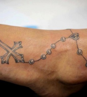 Legs tattoo by Nikki Ouimette