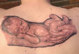 Little baby that born tattoo