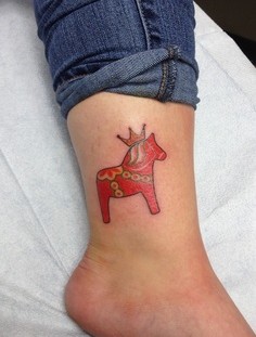 Little red pony on the leg