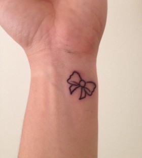 Lovely bow tattoo