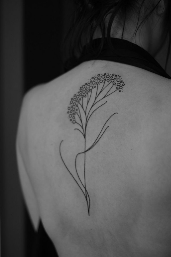 Lovely flower tattoo by Jean Philippe Burton