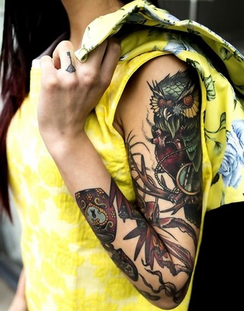 Lovely owl sleeve tattoo