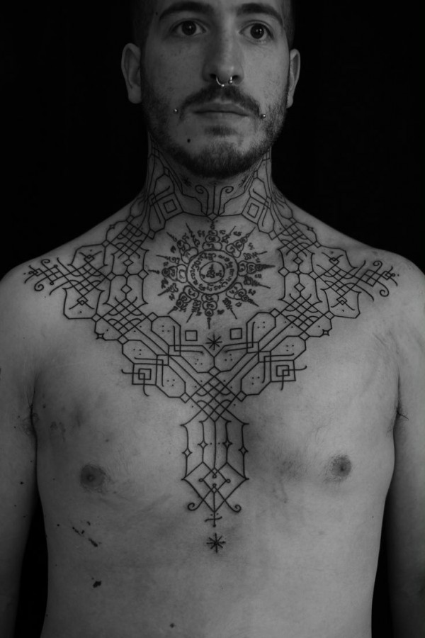 Man tattoo by Jean Philippe Burton
