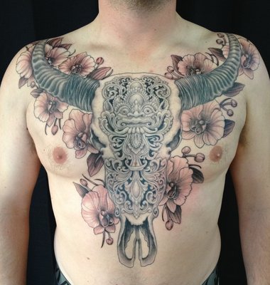 Men chest tattoo by Miah Waska
