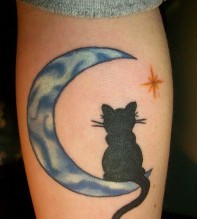 Moon and cat tattoo