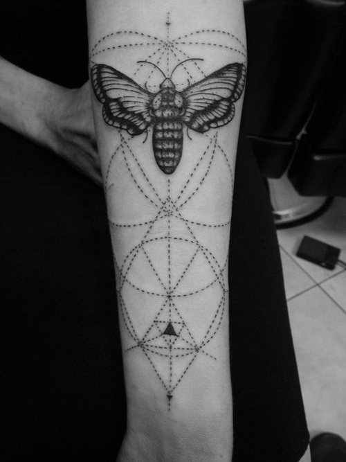 Ornaments and bug tattoo