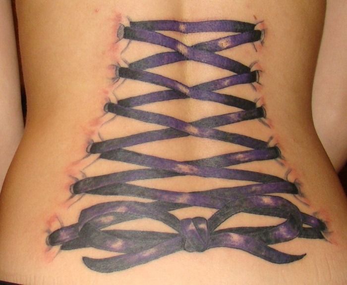 Purple corset tattoo